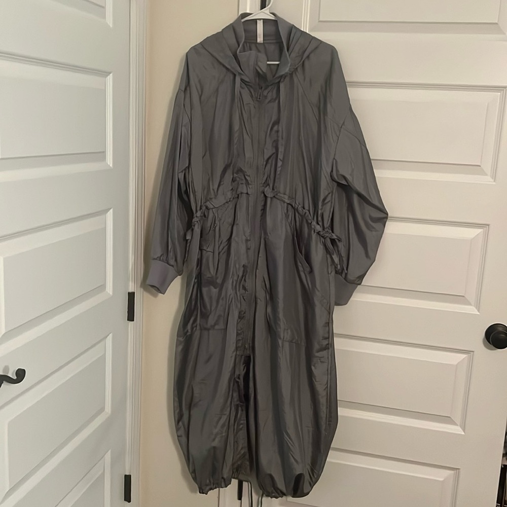 NWT Anthropologie trench in metallic gray color. Hooded with awesome details